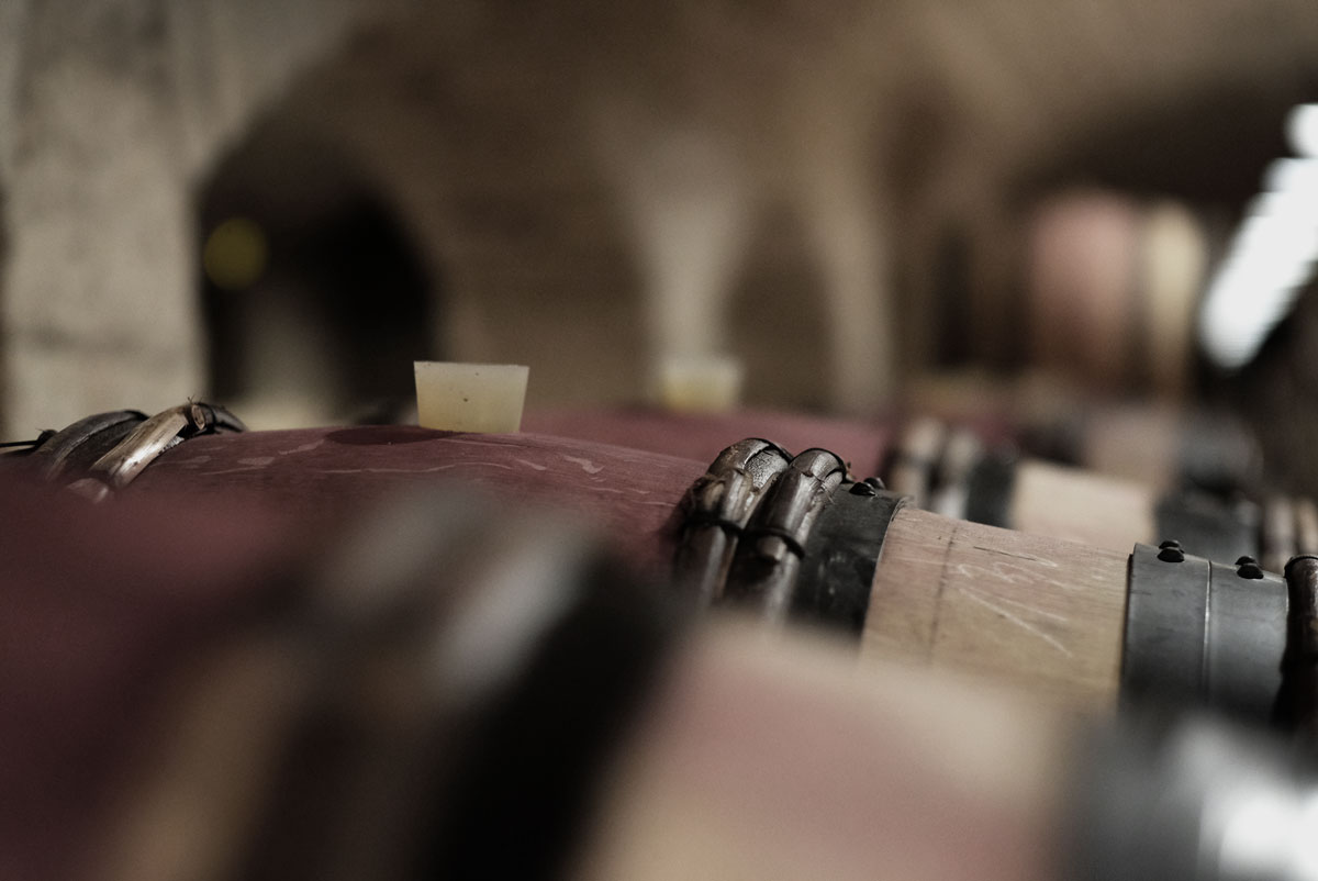 barrel of red wine from Hospices de Beaune in Albert Bichot cellars for aging